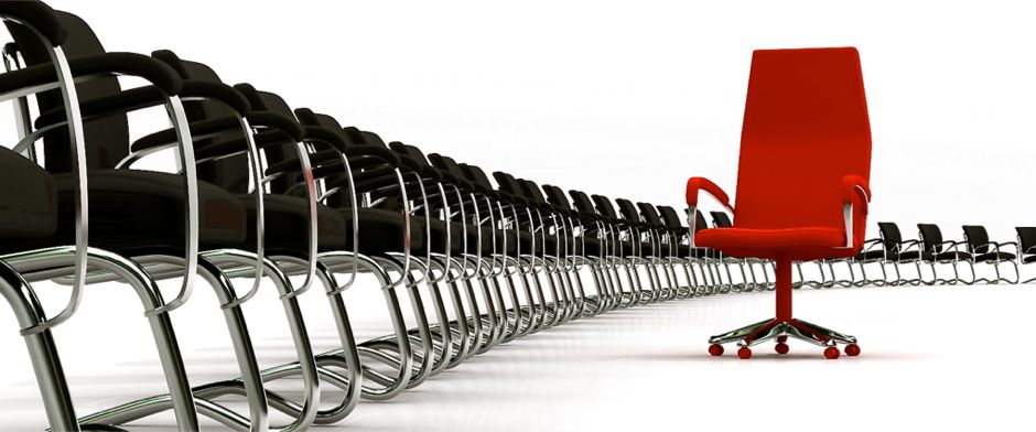 Be Involved_Entreprenurial Fellowships_photo of a sweeping row of black chairs with a lone red executive chair against a white background