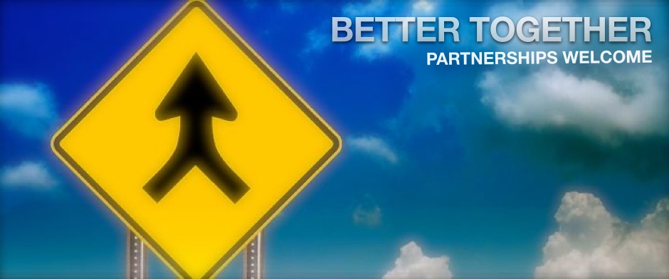 Be Involved_Partnerships_Better Together_photo of yellow diamond traffic sign with two roads merging into one road against a blue sky with puffy white clouds