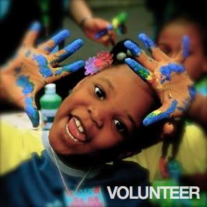 Be Involved_Volunteer_African American toddler with finger paint on her hands