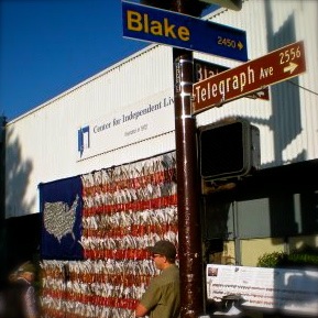 Be Involved_Story Flag Exhibit_phoyto of story flag in front of America's first Indepent Living Center in Berkeley, California